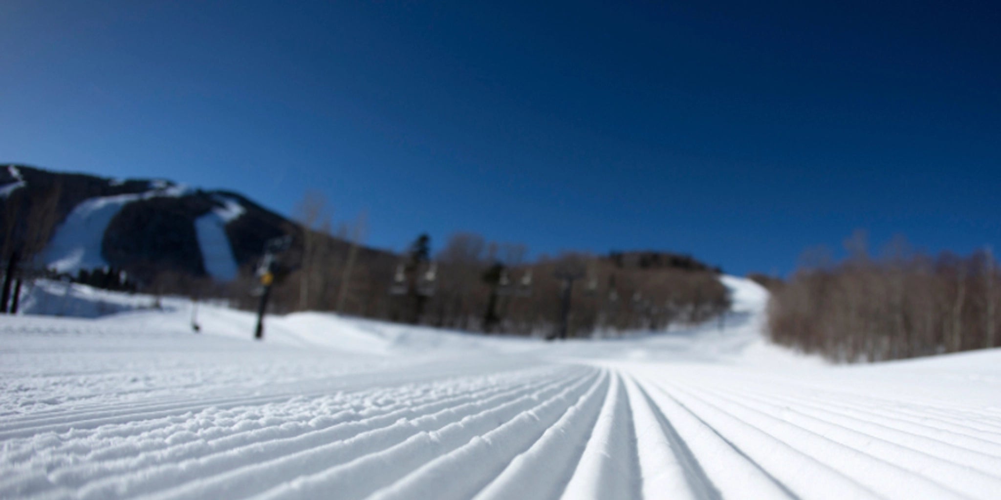 Freshly groomed Killington ski trail with perfect corduroy snow tracks
